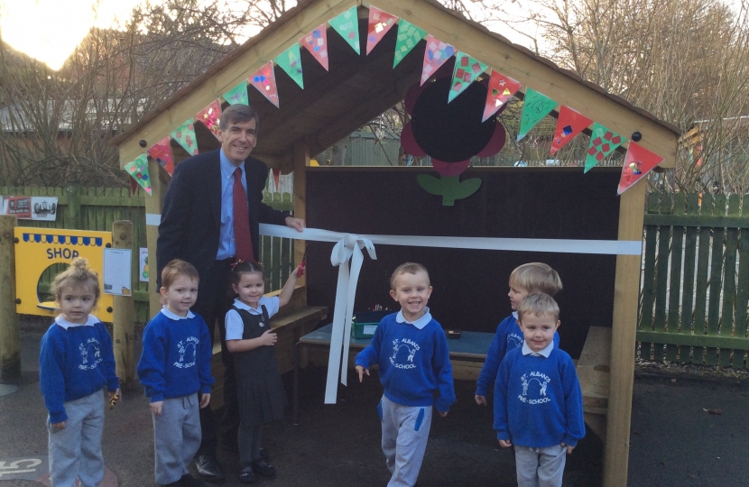 David Rutley MP opening the newly refurbished playground at St Alban's Pre School