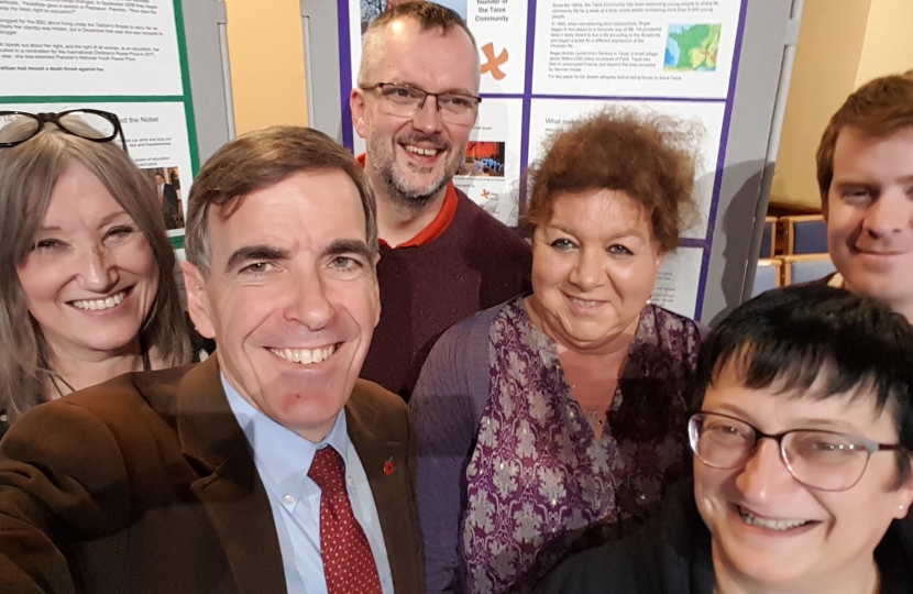 David Rutley MP with other attendees at the Peace Café