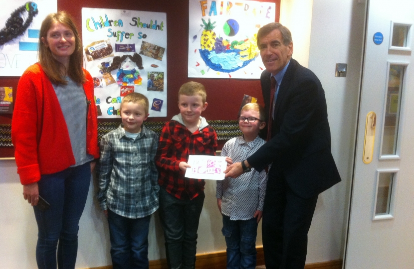David Rutley MP presenting the poster competition prize