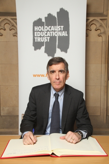 DR signing the Holocaust Educational Trust's Book of Commitment