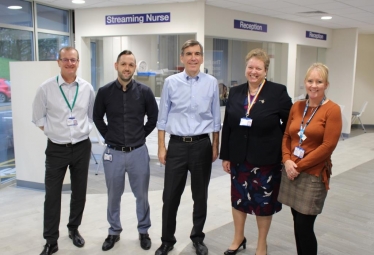 David Rutley MP with, from l-r: Chief executive John Wilbraham, operational manager for urgent care Rhodri Morgan, trust chairman Lynn McGill and Alison Proctor, service manager for the trust’s GP Out-of-Hours Service.