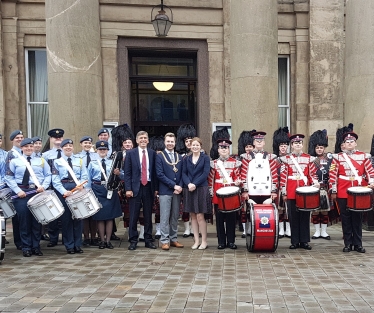 DR with Cllr Adam Schofield, his consort, Heather, and members of the Manchester branch of the Pipes and Drums of the Scots Guards Association and the Greater Manchester Wing Band Royal Airforce Air Cadets.