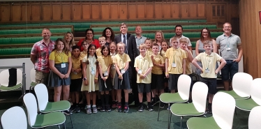 David Rutley MP with staff and students from Puss Bank Primary School.