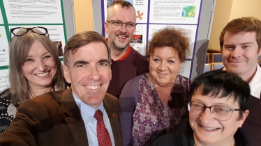 David Rutley MP with other attendees at the Peace Café