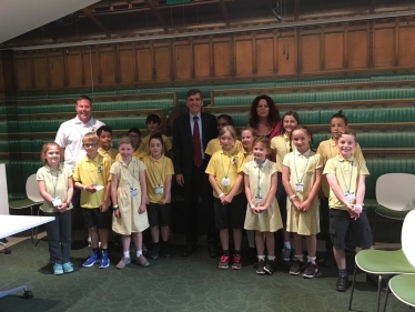 David Rutley MP with pupils and staff from Puss Bank School