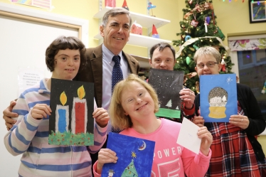 David Rutley MP with Andrea Bennett (winner) and members of the Oakwood art group representing the runners up of the competition. Eleanor Dobson (furthest to the right at the back) is one of the runners-up in the competition